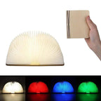 Lampe livre LED pliable, design innovant, éclairage multicolore, portable, idéale pour décoration intérieure, lecture, cadeau original.
