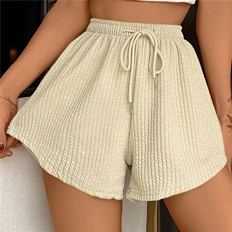 Noor - Shorts anchos con cordón