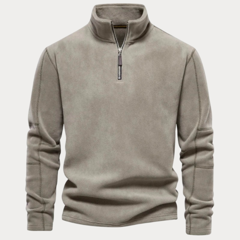 Pull polaire gris clair pour homme avec col zippé, manches longues et coupe décontractée. Vêtement chaud idéal pour l'hiver et les activités extérieures.