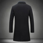 Manteau noir élégant pour homme, coupe longue, col classique, style moderne, idéal pour l'hiver et les occasions formelles.