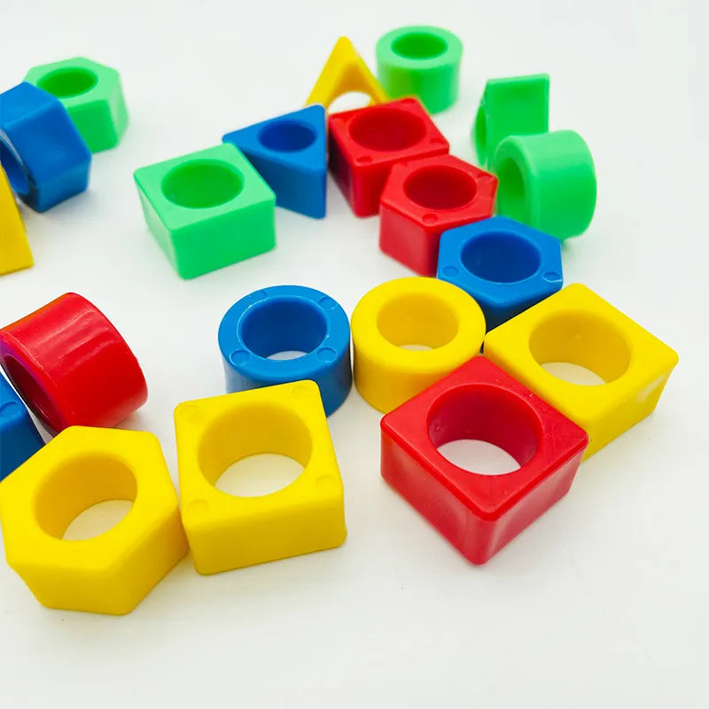 Blocs de construction en plastique colorés, formes géométriques variées, jouets éducatifs pour enfants, apprentissage des couleurs et formes.