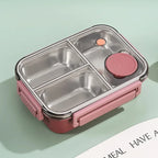 Boîte à lunch bento en acier inoxydable avec compartiments, couvercle hermétique rose, idéale pour repas équilibrés, transport alimentaire sécurisé.