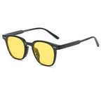 Lunettes de soleil carrées avec monture noire et verres jaunes, style rétro, protection UV, accessoire de mode tendance pour hommes et femmes.