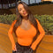 SARAN | Body naranja fluorescente