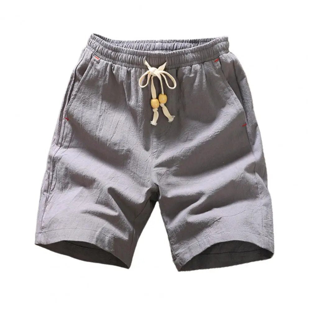 Short en lin gris pour homme avec cordon de serrage, poches latérales. Vêtement d'été décontracté, confortable et respirant.