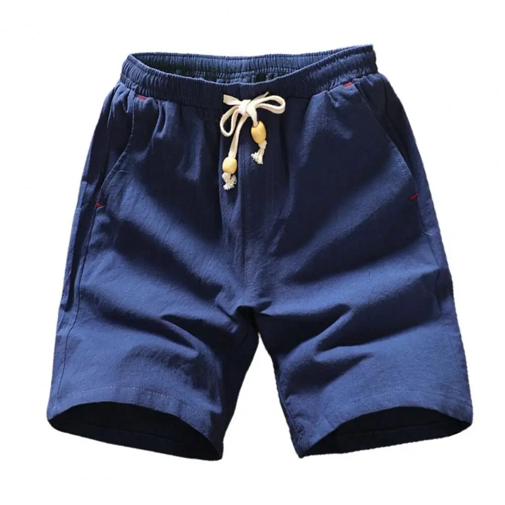 Short bleu marine en lin pour homme avec cordon de serrage beige, poches latérales. Style décontracté, idéal pour l'été et les vacances.