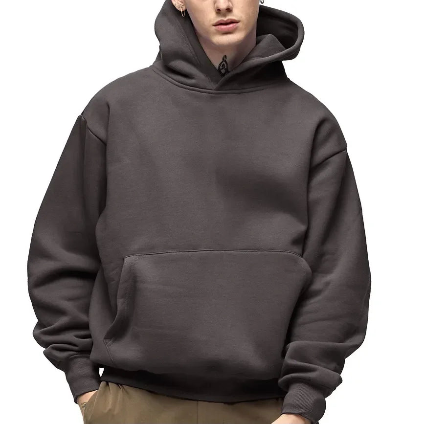 Sweat à capuche unisexe gris foncé, poche kangourou, manches longues, style décontracté, idéal pour mode urbaine et confort quotidien.