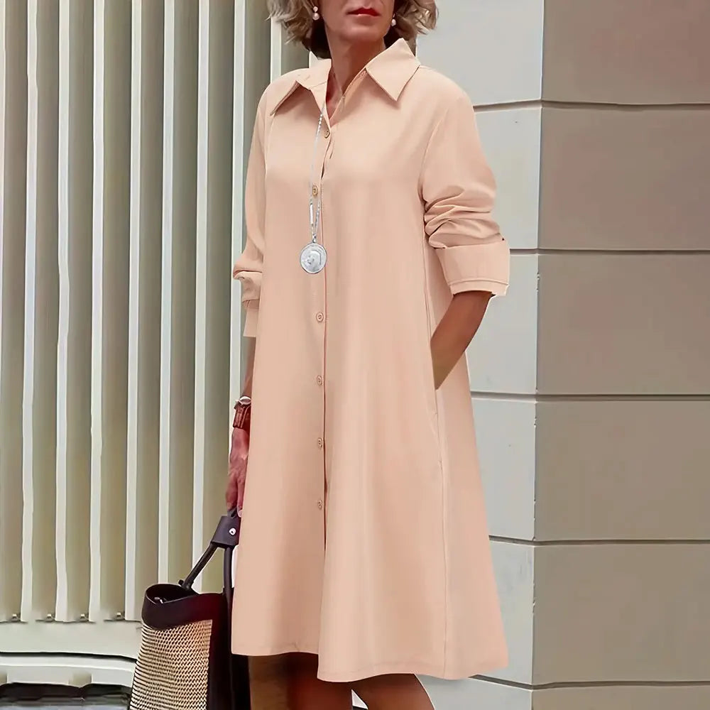 Vestido camisero de corte A para mujer, abotonado, manga larga, cuello clásico y largo hasta la rodilla.