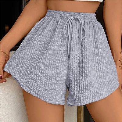 Noor - Shorts anchos con cordón