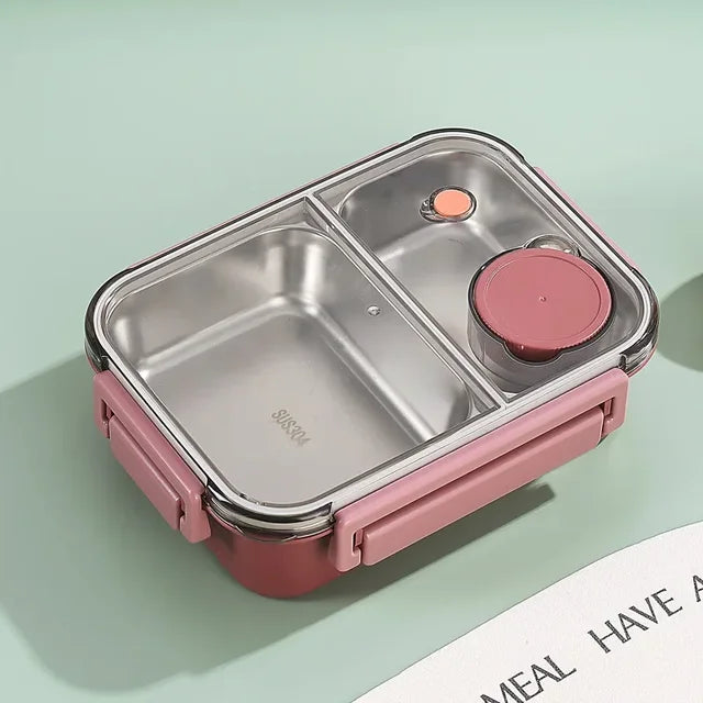 Boîte à lunch en acier inoxydable rose avec compartiments, couvercle hermétique et bouton de ventilation. Idéale pour repas sains et transportables.