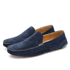Mocassins en daim bleu marine pour homme, couture blanche, semelle antidérapante. Chaussures élégantes et confortables, style décontracté.