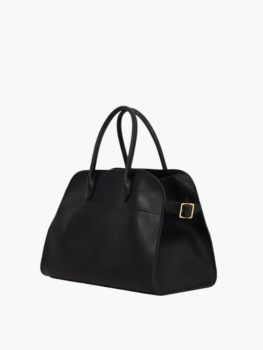Sac à main noir en cuir élégant avec poignées doubles et boucle dorée, design moderne et minimaliste, accessoire mode femme tendance.