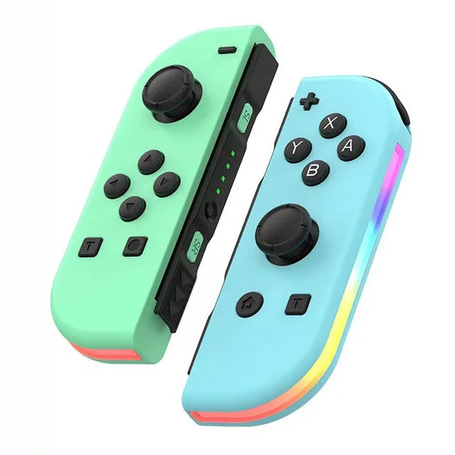 Deux manettes de jeu sans fil colorées, vert menthe et bleu, avec boutons noirs et LED arc-en-ciel, compatibles avec console Nintendo Switch.