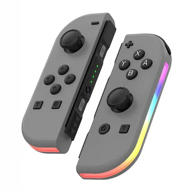 Manettes de jeu sans fil grises avec boutons noirs et lumières LED colorées, compatibles avec console de jeu, design ergonomique pour gamers.