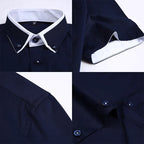 Chemise homme bleu marine à col blanc, boutons contrastés, manches longues, détails couture. Mode élégante, tenue formelle, style classique.