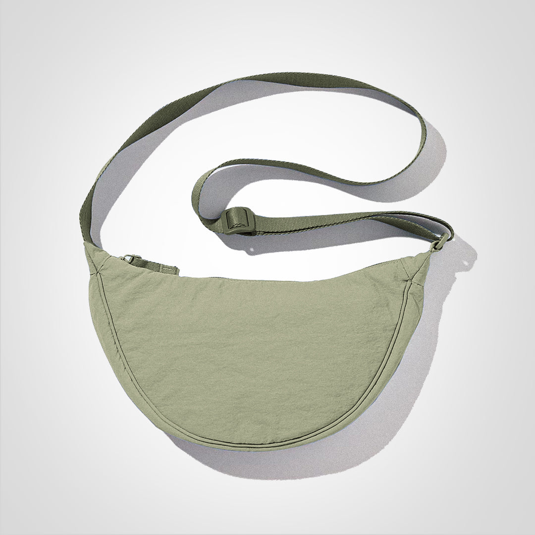 Sac banane vert olive en tissu, design minimaliste avec sangle ajustable. Accessoire mode tendance pour homme et femme, idéal pour sorties urbaines.