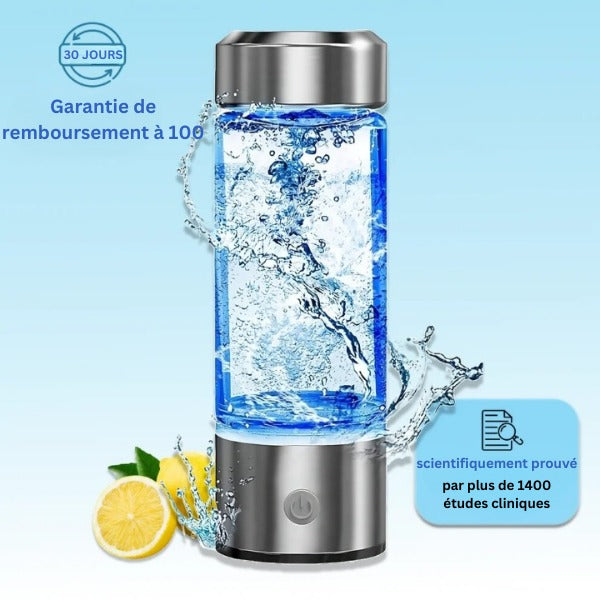 Carafe d'eau hydrogène avec bulles, design moderne en acier inoxydable, citron en arrière-plan, garantie 30 jours, prouvée par 1400 études cliniques.
