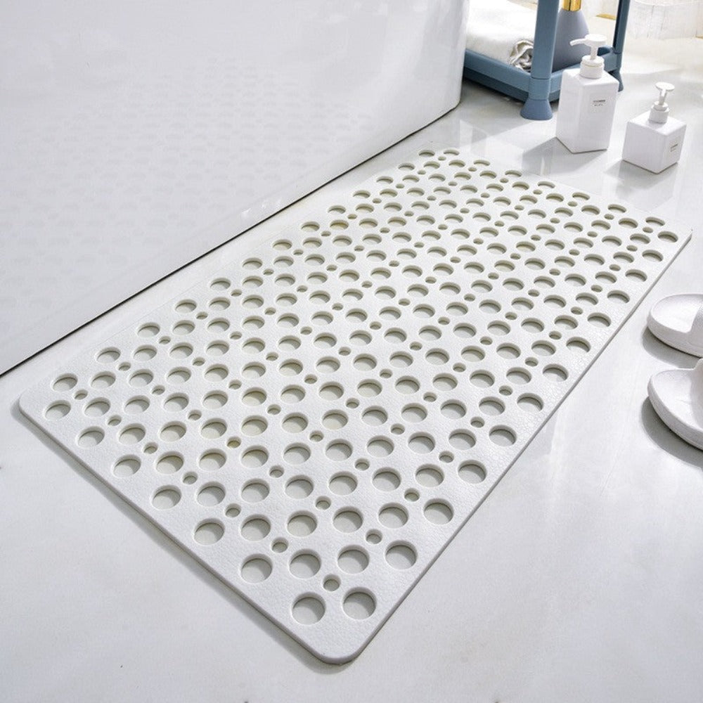 Tapis de bain antidérapant blanc avec trous, idéal pour salle de bain moderne. Sécurité et confort, design élégant, facile à nettoyer.