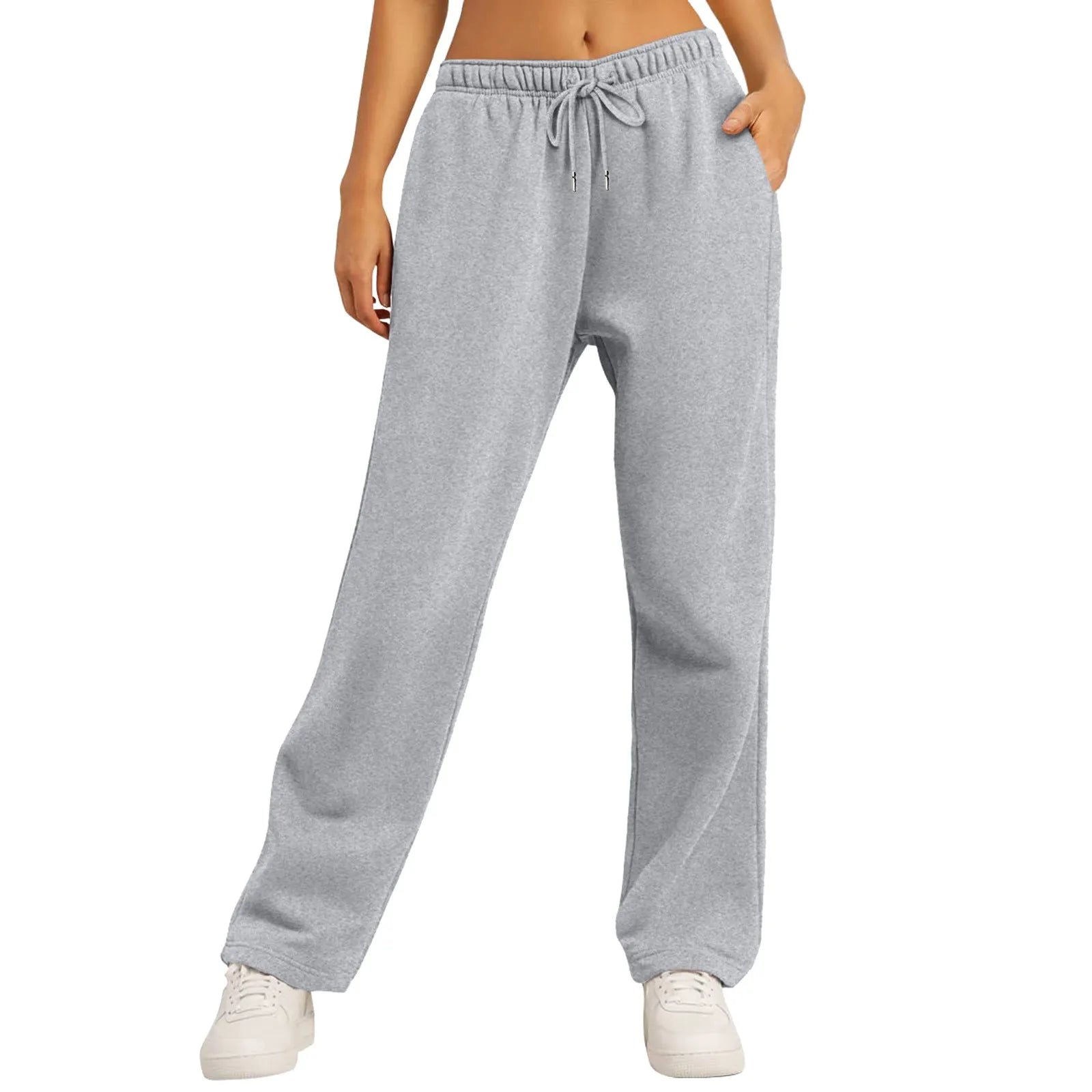 Pantalon de jogging gris pour femme, taille élastique avec cordon, coupe ample, confortable et décontracté, idéal pour sport et détente.