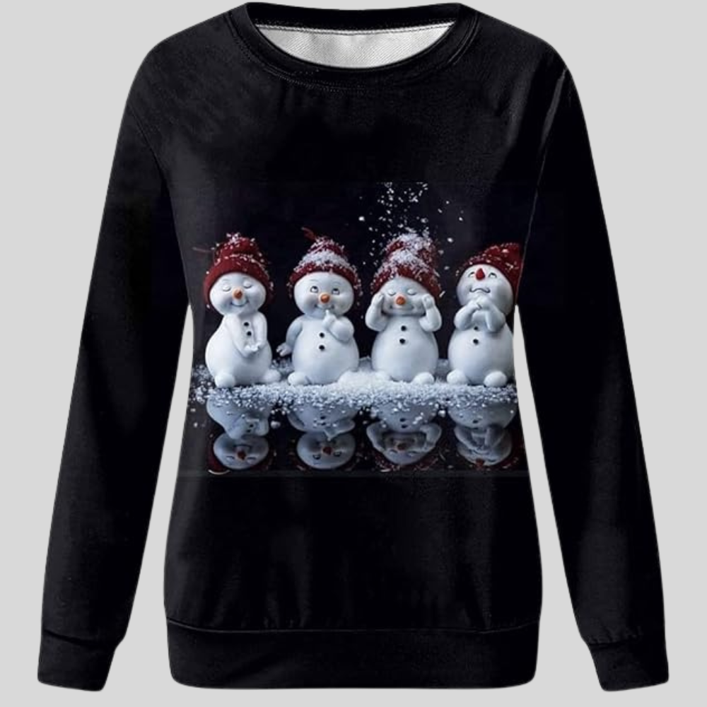 Sweatshirt noir avec motif de quatre bonhommes de neige portant des bonnets rouges, sur fond de neige. Mode hiver, vêtement chaud, style décontracté.