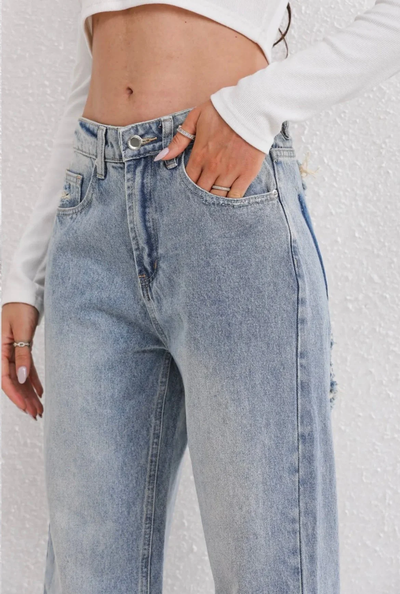 Jeans coupe droite avec look distressed - denim vintage avec détails modernes
