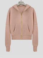 Sweat à capuche rose pâle pour femme avec fermeture éclair dorée, poches avant, manches longues, style décontracté, idéal pour l'automne.