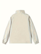 Veste imperméable beige pour femme, coupe-vent, manches longues, col montant, idéale pour la randonnée et les activités extérieures.