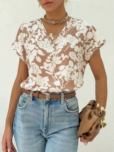 Blusa floral con escote en pico