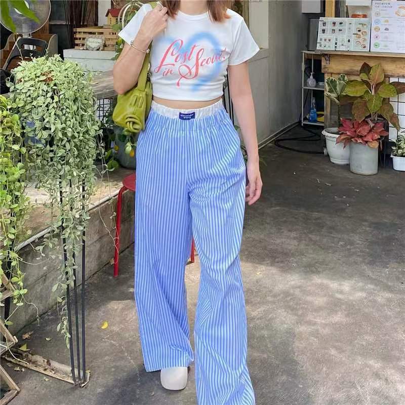 Gabrielle - Pantalones anchos con rayas verticales