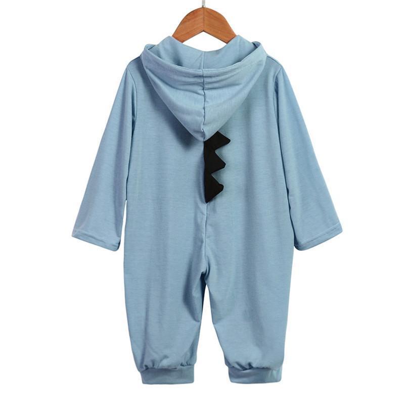 Combinaison bébé bleue avec capuche, motif dinosaure noir, manches longues, fermeture à boutons, vêtement enfant confortable et chaud.