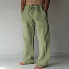 Pantalon en lin vert pour homme, ample et confortable, avec cordon de serrage, poches latérales, style décontracté et estival.