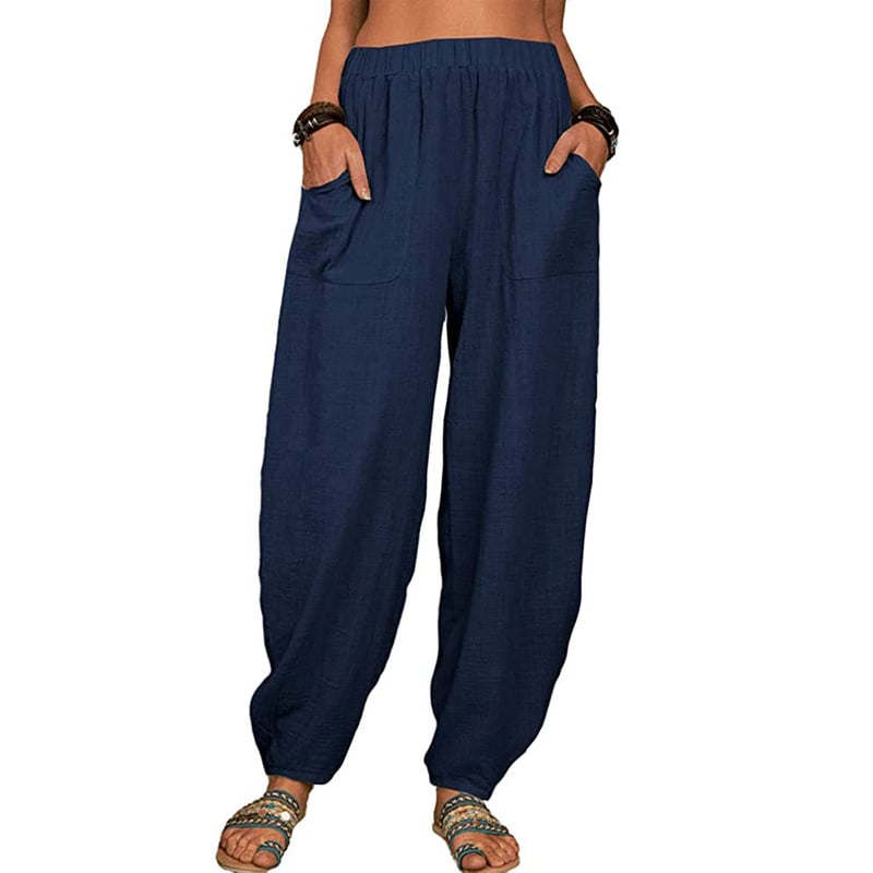 Pantalon ample bleu marine pour femme, taille élastique, poches avant, style décontracté, idéal pour l'été, mode confortable et tendance.