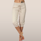 Pantalon capri beige pour femme, taille basse, avec cordon de serrage, idéal pour l'été et les tenues décontractées.