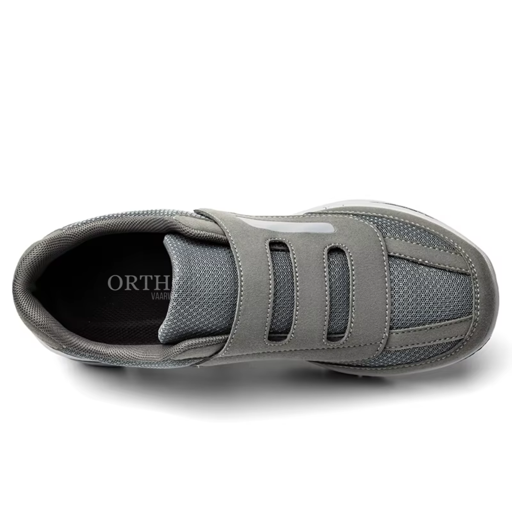 Chaussure orthopédique grise vue de dessus, avec fermeture à scratch, semelle antidérapante, design ergonomique pour confort et soutien optimal.