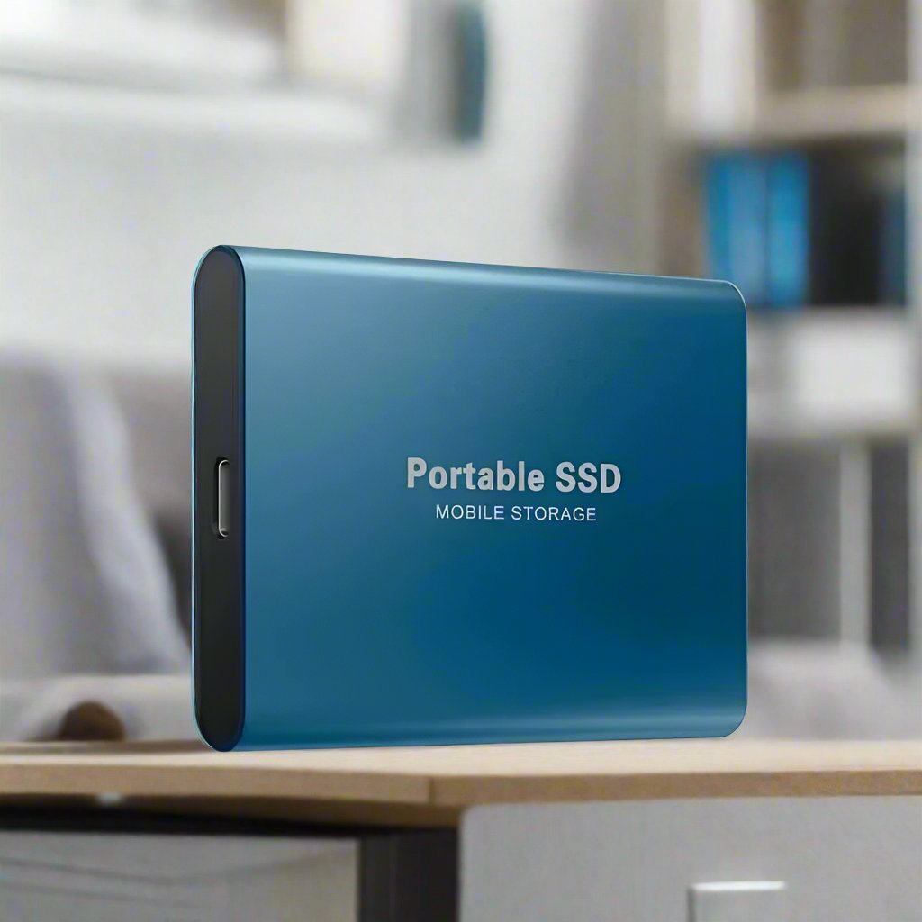 Disque SSD portable bleu sur une table, stockage mobile rapide et compact, idéal pour sauvegarde de données et transfert rapide de fichiers.