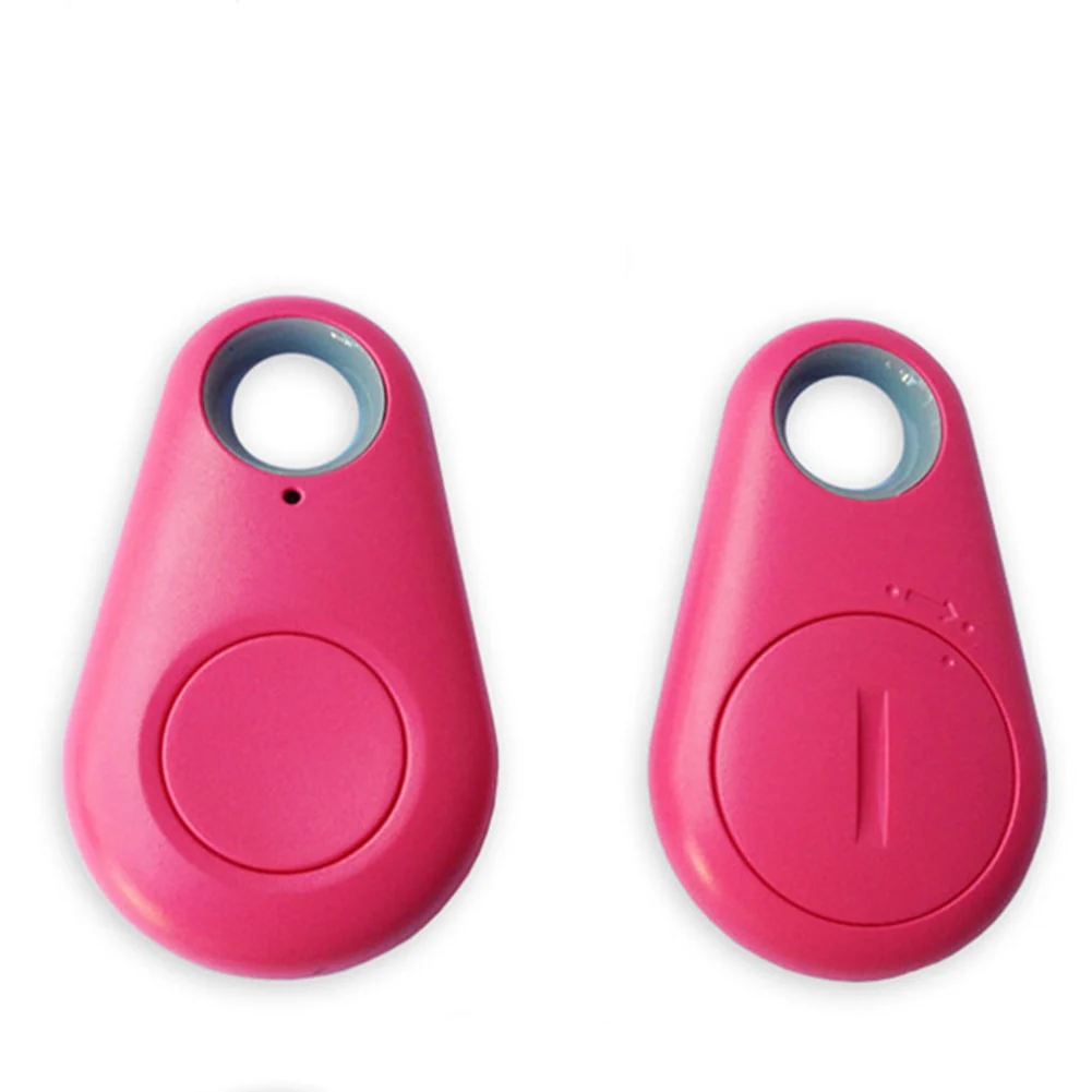Porte-clés traqueur Bluetooth rose, dispositif de localisation d'objets, technologie sans fil, accessoire pratique pour retrouver clés et objets perdus.
