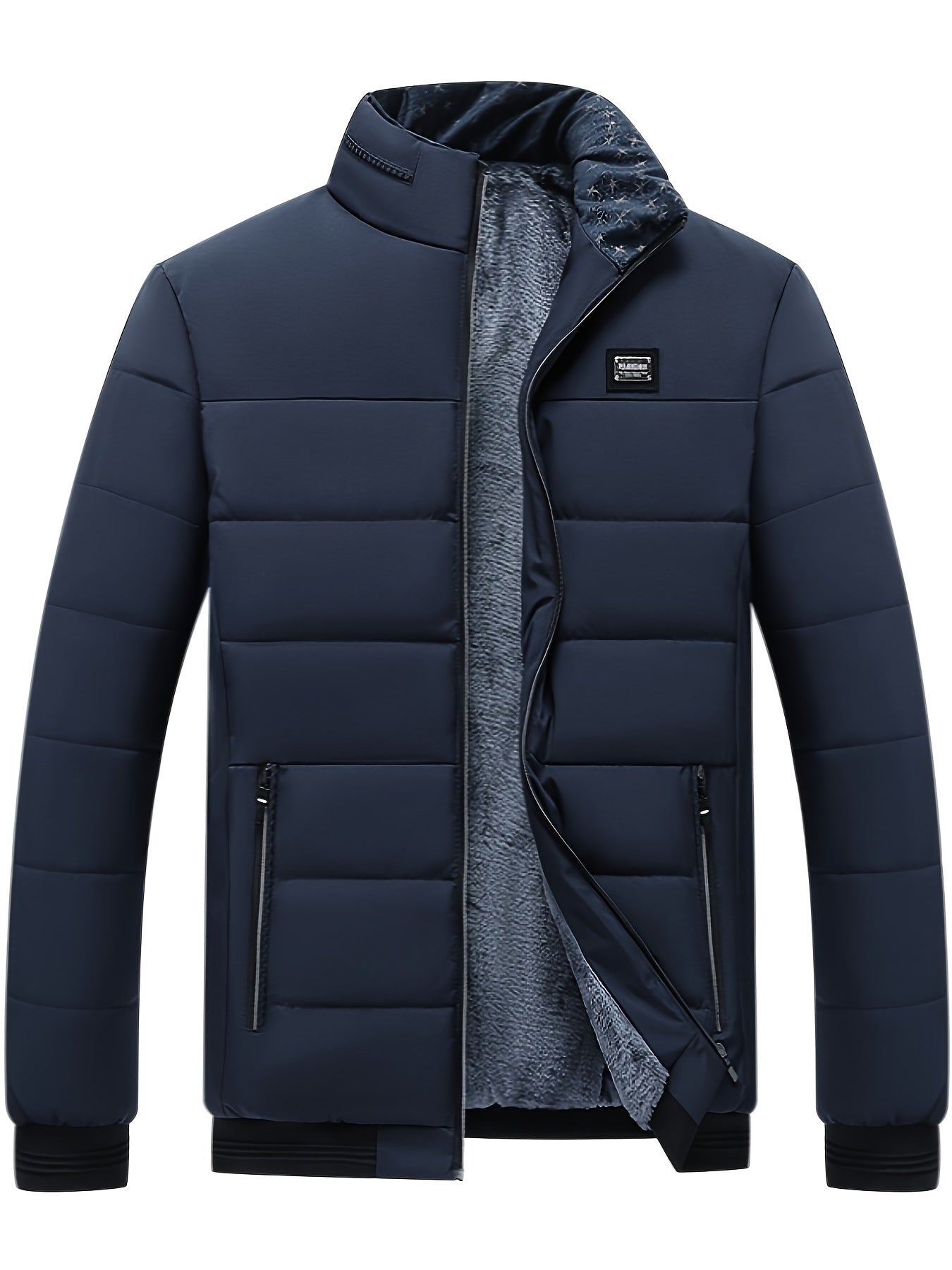 Veste matelassée bleu marine pour homme, doublure en polaire, fermeture éclair, col montant, poches zippées. Mode hiver élégante et chaude.