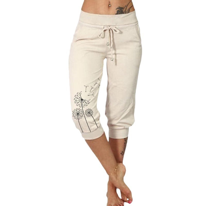 Pantalon capri beige pour femme avec motif pissenlit, taille élastique, cordon de serrage, style décontracté, idéal pour l'été et le yoga.