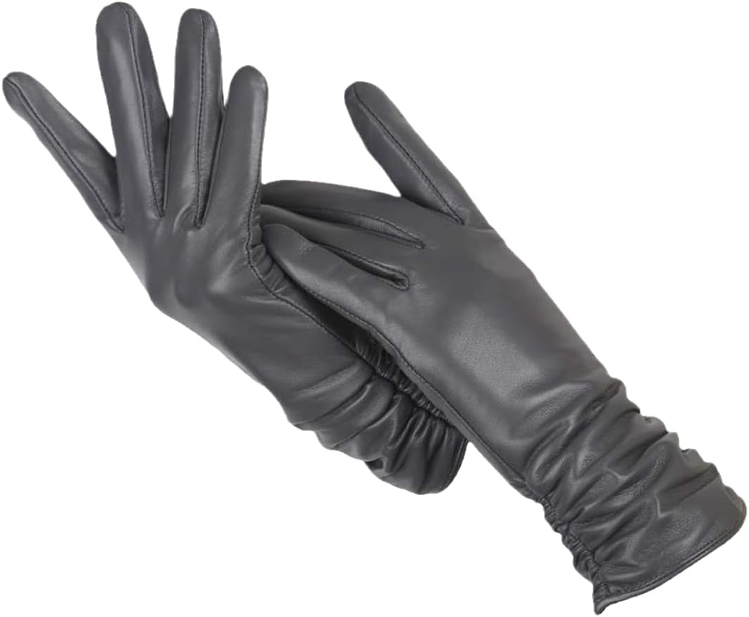 Gants en cuir noir élégants pour femme, longs et ajustés, parfaits pour l'hiver et la mode, accessoire chic et tendance.