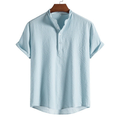 Camisa de lino a rayas para hombre con tapeta de medio botón