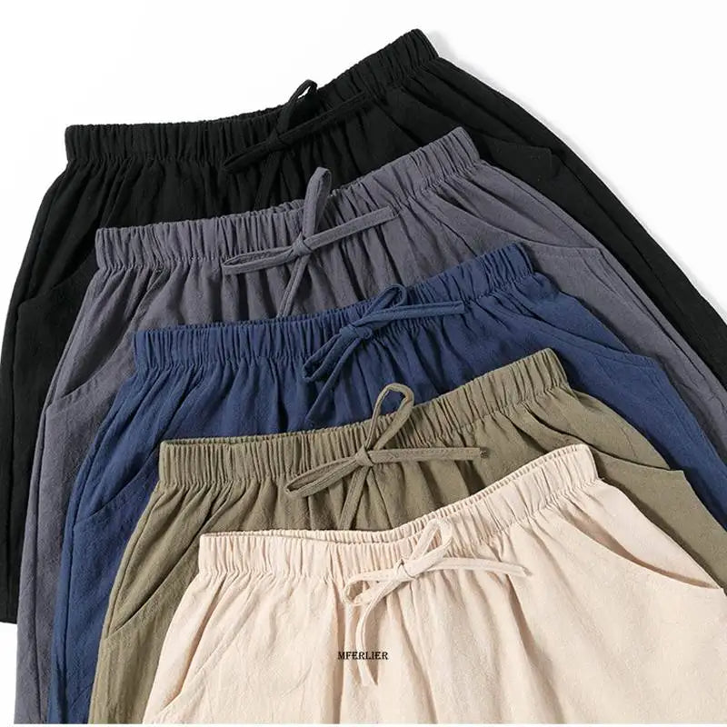 Shorts en lin pour hommes, disponibles en cinq couleurs : noir, gris, bleu, vert kaki et beige. Taille élastique avec cordon de serrage. Mode décontractée.