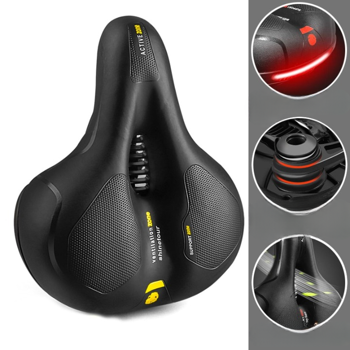 Selle de vélo ergonomique noire avec coussinets en gel, bandes réfléchissantes et suspension amortissante. Accessoire cyclisme confort et sécurité.