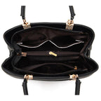 Sac à main noir en cuir avec doublure intérieure marron, plusieurs compartiments zippés, poignées robustes, idéal pour organisation et style élégant.