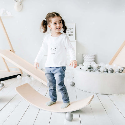 Montessori Motion | Tabla de madera oscilante