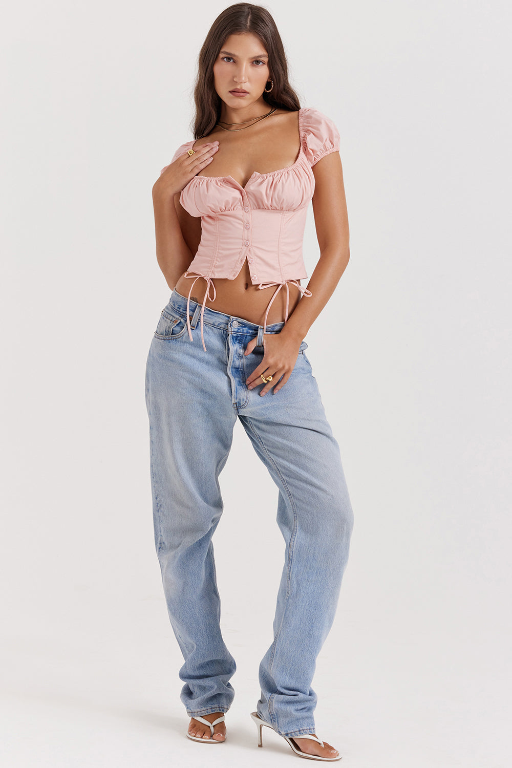Top con volantes rosa bebé