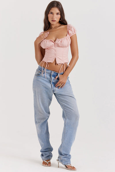 Top con volantes rosa bebé