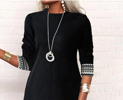 Minivestido de manga larga en blanco y negro con estampado azteca