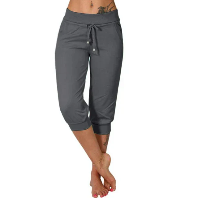 Pantalon capri gris pour femme, taille élastique avec cordon, poches latérales, style décontracté, idéal pour le sport et les loisirs.