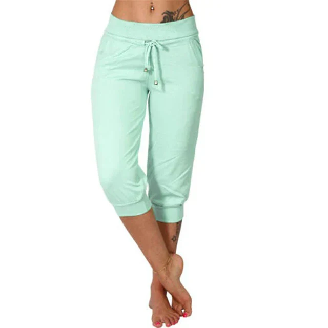 Pantalon capri vert menthe pour femme, taille élastique avec cordon, poches latérales, style décontracté, idéal pour l'été et le sport.