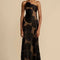 Elegante vestido largo de malla floral.